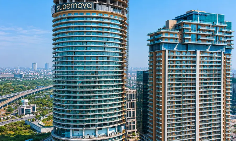 Aerial view of Supernova Spira tower Noida — Mulberry Homes service apartment