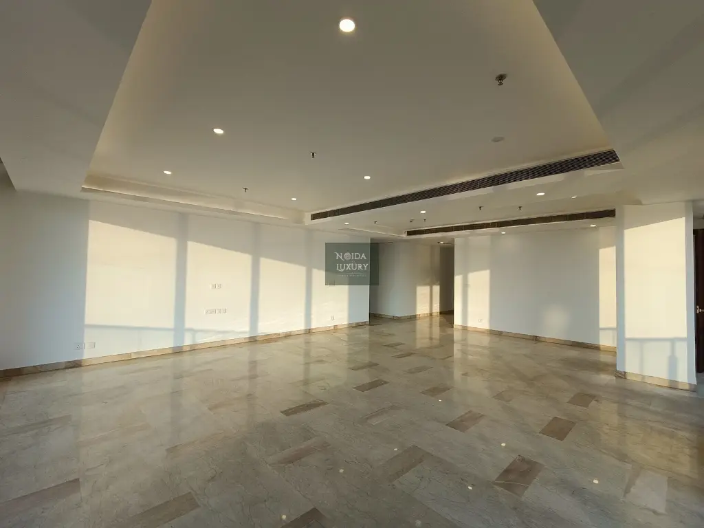 Luxury living and dining area in 4 BHK penthouse at Nova Residences Supertech Supernova Noida