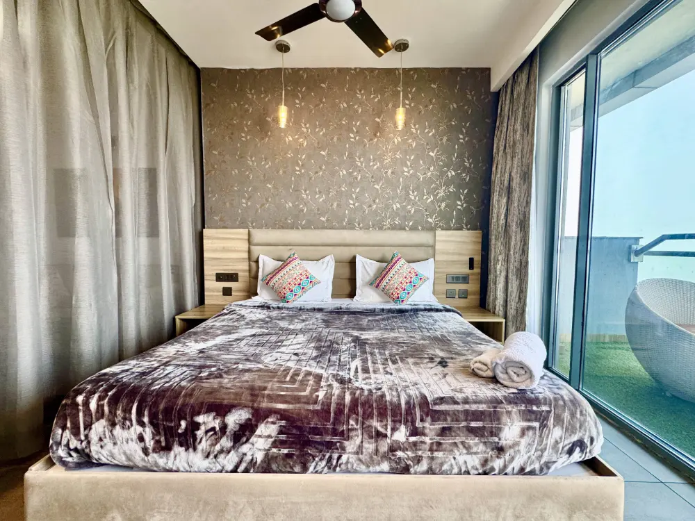 CityGlow 28 modern bedroom at Supernova 94 Noida river and city view apartment