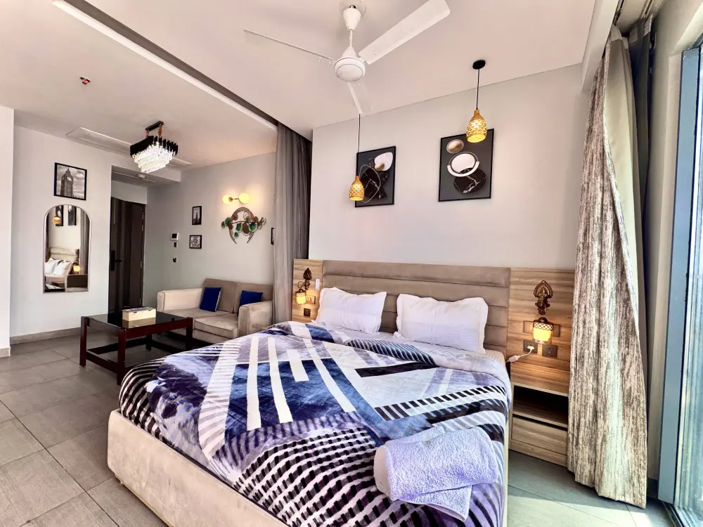 Blue decor bedroom at RiverAura 33 Supernova Spira Noida