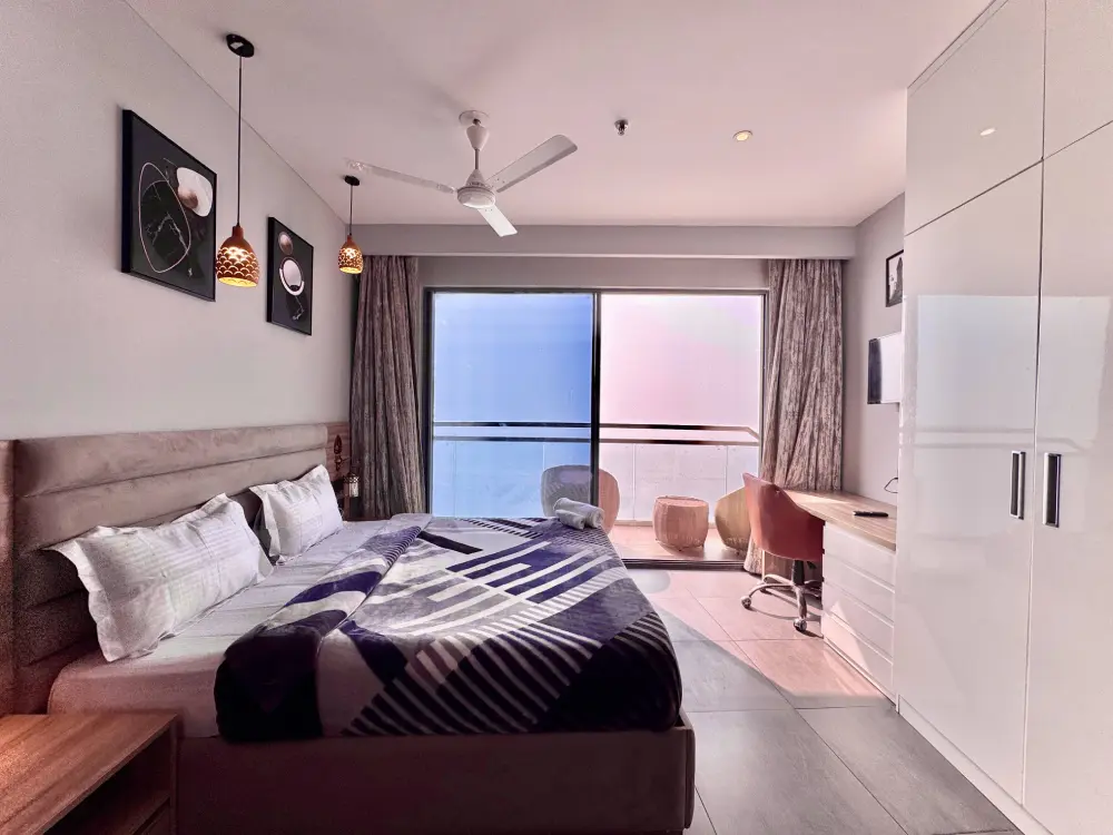 RiverAura 33 Yamuna river view room high floor apartment Noida skyline