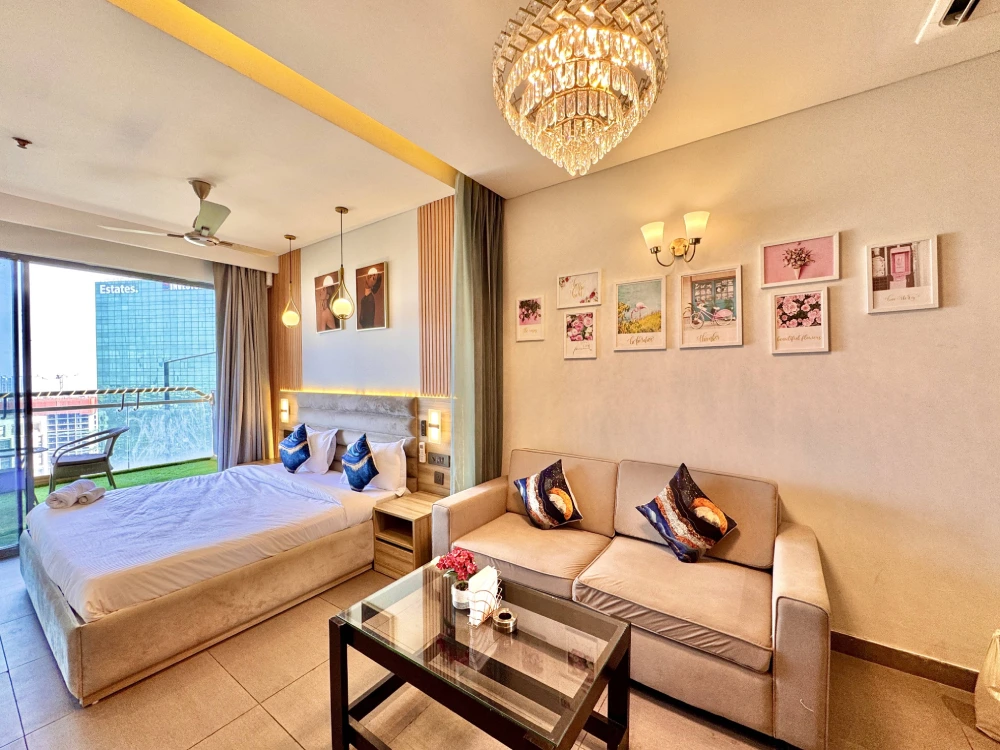 Skyline Stay 23 elegant bedroom with window view at Supernova Spira Noida