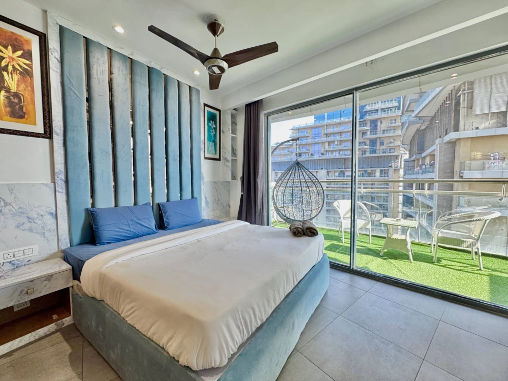Living room with wooden decor at Mulberry Homes Supernova Spira Noida